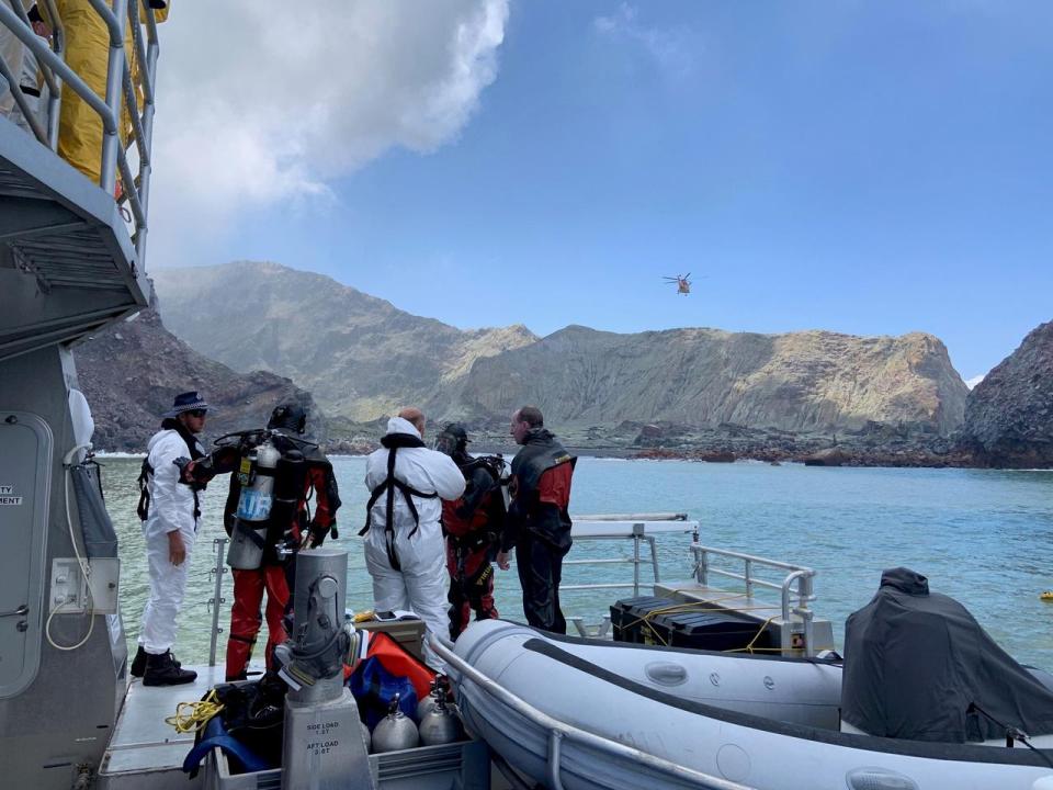New Zealand divers search for volcano victims; death toll rises to 15