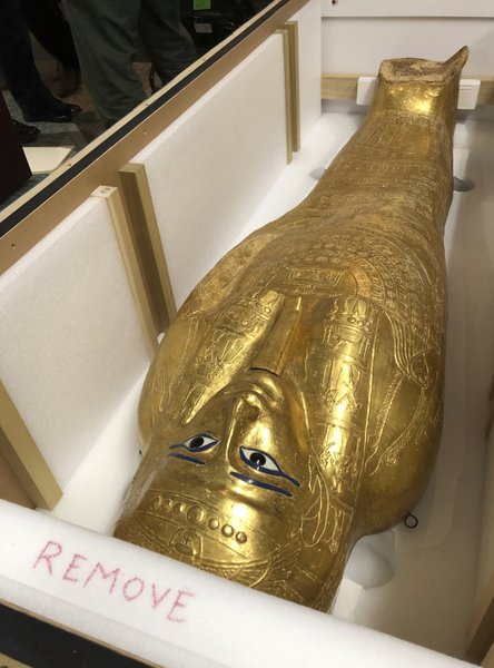 Ancient gilded coffin is returned to Egypt government