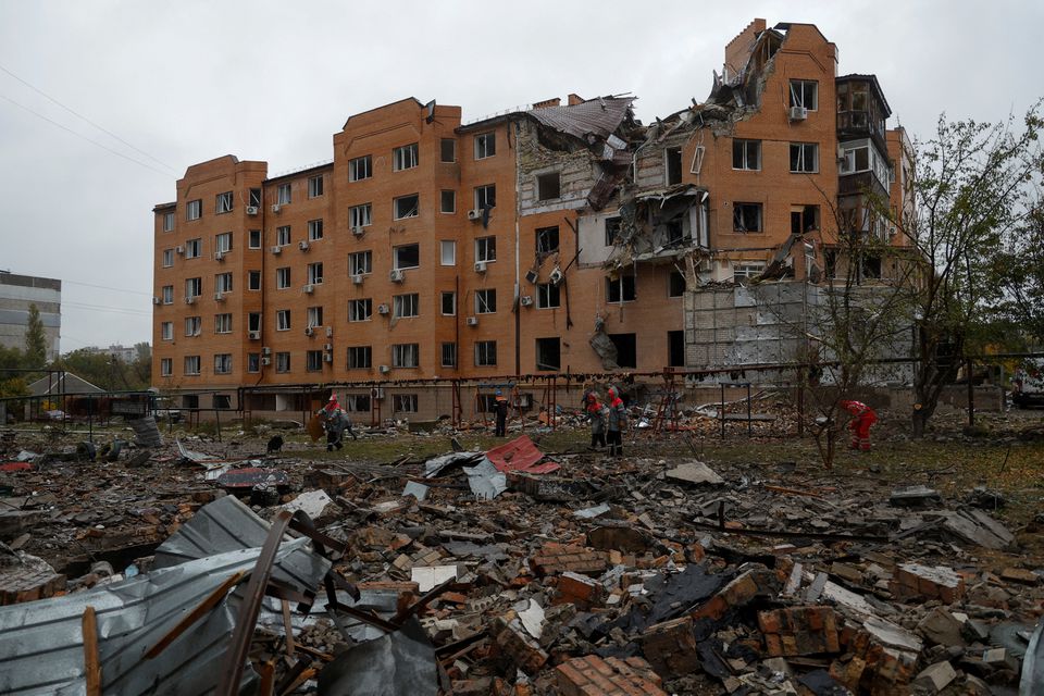 Russia hits Ukraine homes, evacuates Kherson, warns of escalation