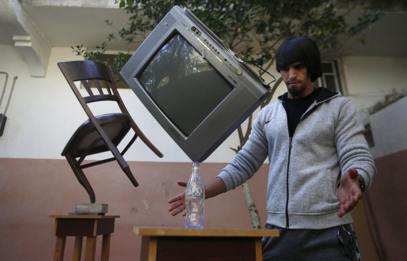 Gaza man masters rare skill of balancing art