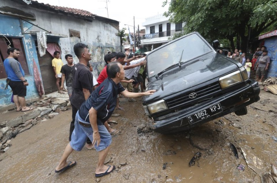 Indonesia plans cloud seeding to halt rain, floods death toll rises to 43