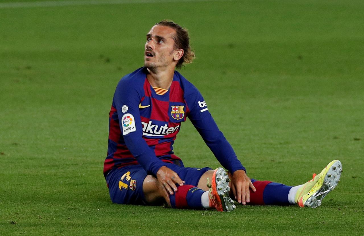 Barca's Griezmann injured, likely to miss title run-in