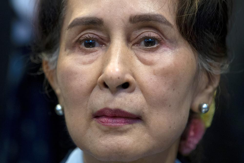Thai diplomat meets with Suu Kyi in detention in Myanmar and says she wants to join talks on crisis