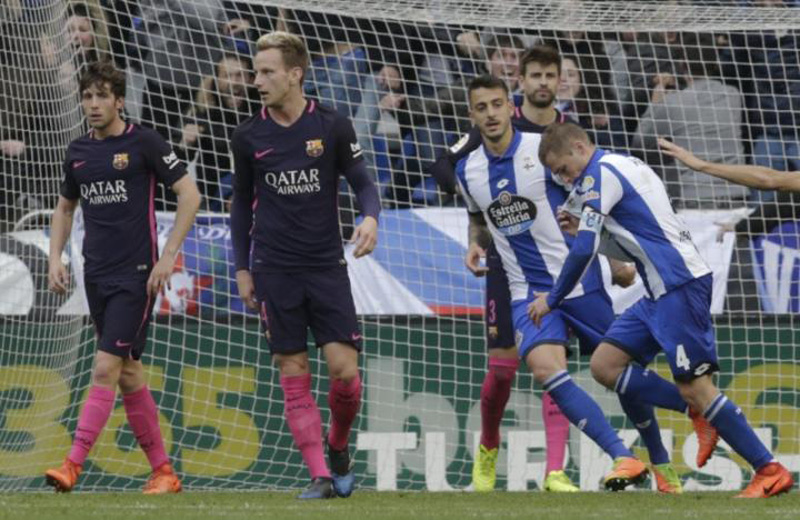Barca stunned by Deportivo, Ramos heads Real top
