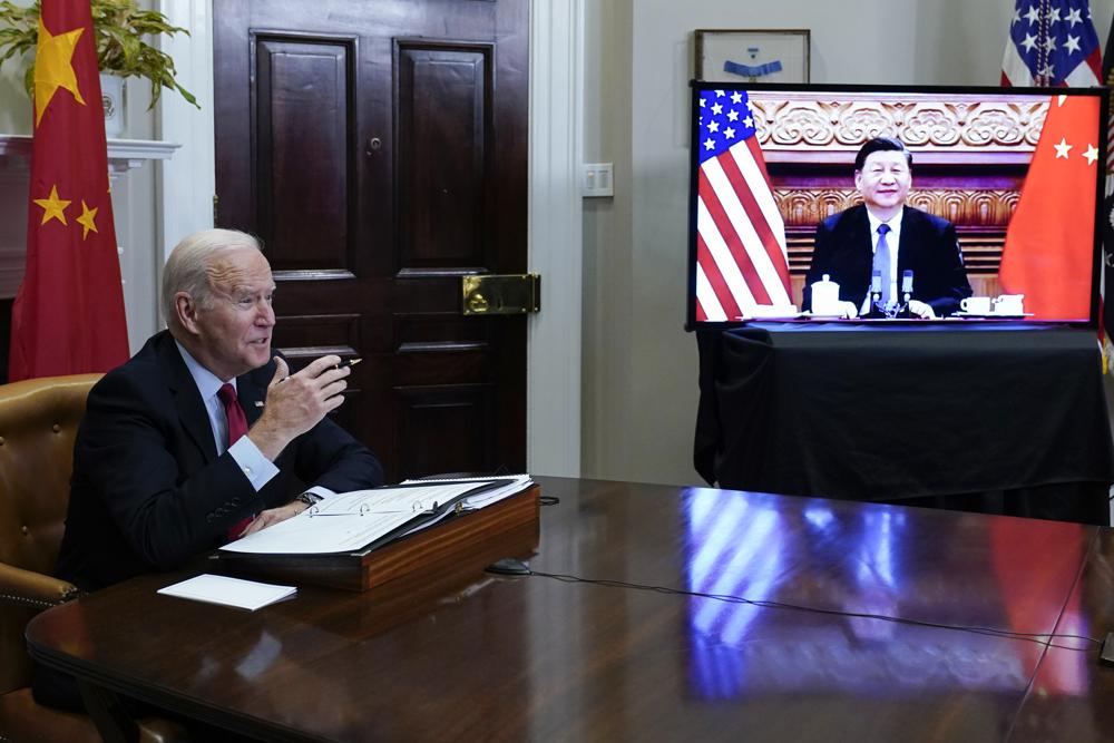Biden and Xi meet virtually as US-China chasm widens
