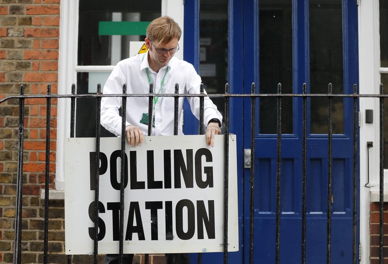 Polls open in UK election after campaign marred by attacks