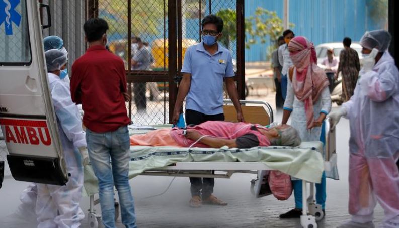 Many Indian hospitals overwhelmed by COVID surge as beds, oxygen fall short