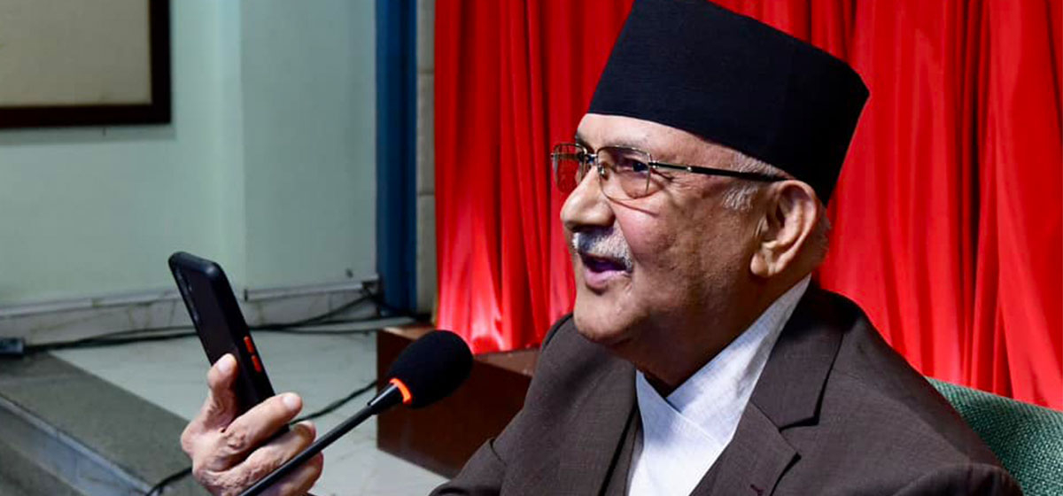 KP Oli interacts with general public over the phone