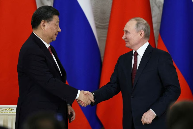 Putin praises 'unprecedented' energy ties with China
