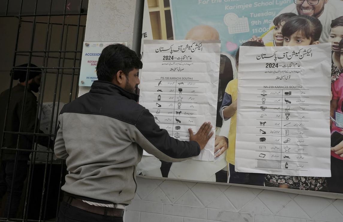 Pakistan votes for a new parliament as militant attacks surge and jailed leader’s party cries foul