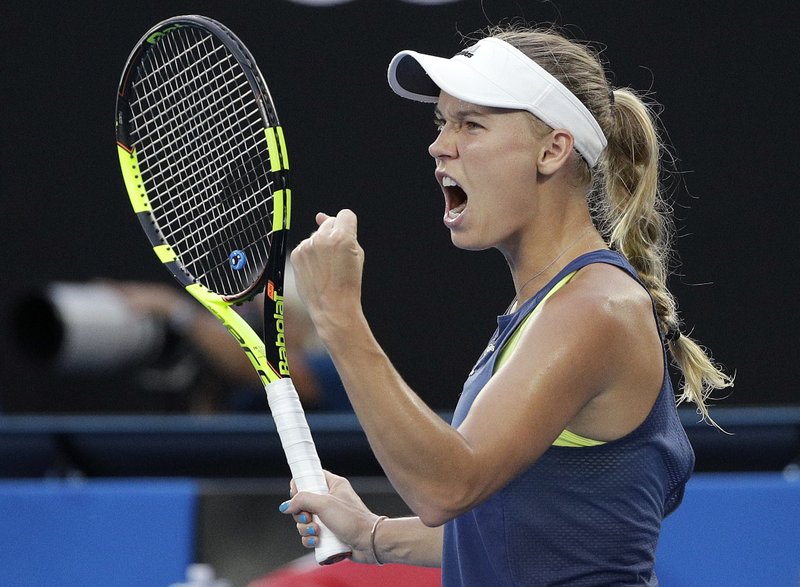 Wozniacki beats Halep to win 1st major at Australian Open