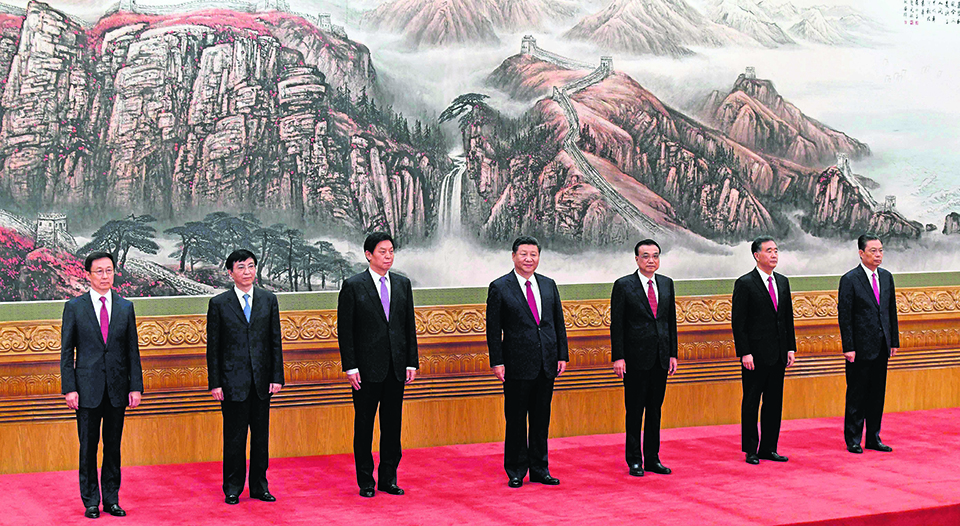 China unveils new top leadership, Xi gets second term
