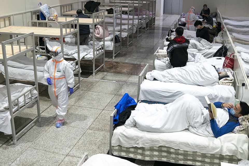 China opens new hospitals for virus patients, deaths top 560