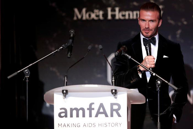 Bidding for Beckham: Football star among lots at Cannes AIDS auction