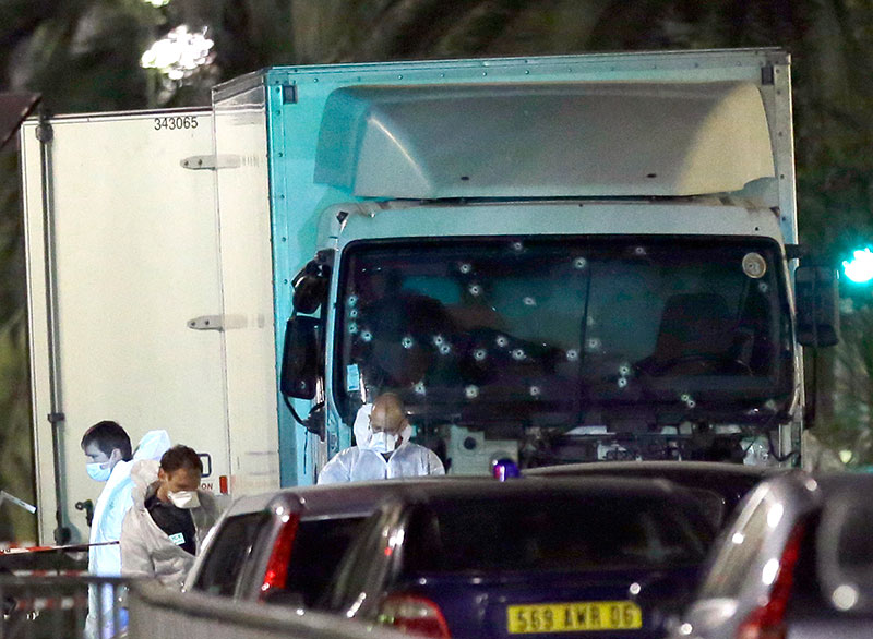 At least 80 killed as truck slams into revelers in Nice