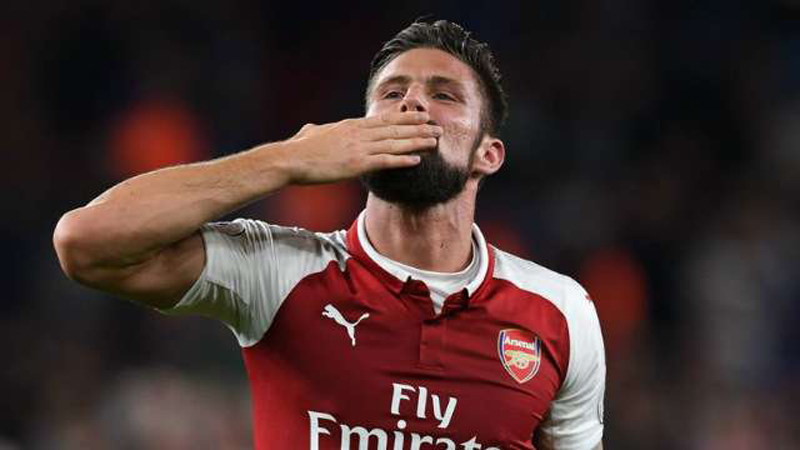 Giroud header seals Arsenal win in season-opening thriller