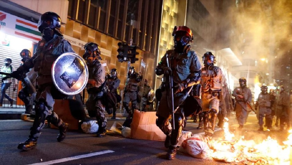 China warns U.S. of retaliation for law backing Hong Kong protesters
