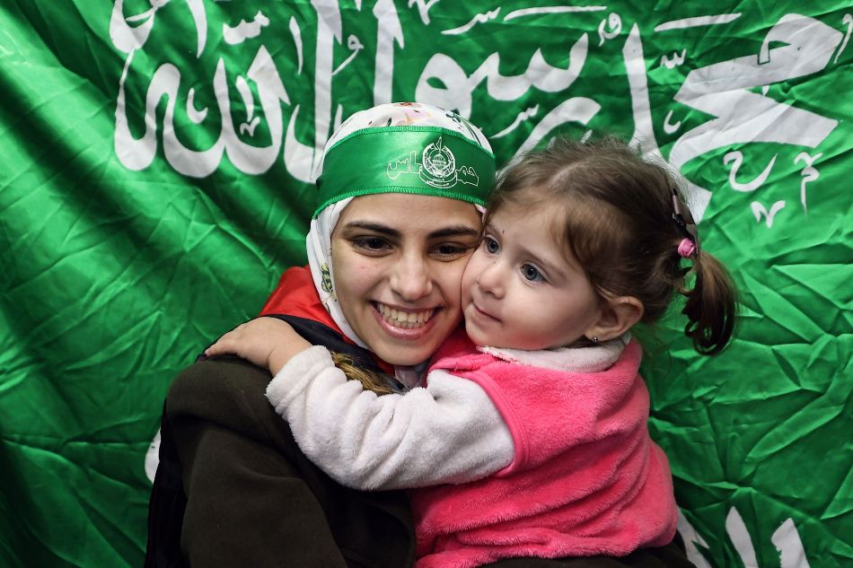 Hamas fighters free first wave of hostages in Gaza truce