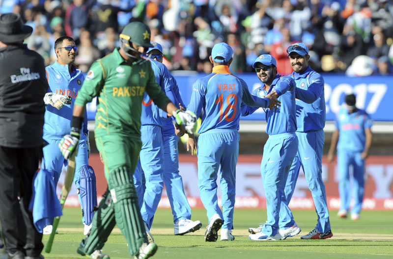 India thrashes Pakistan by 124 runs to lead CT group