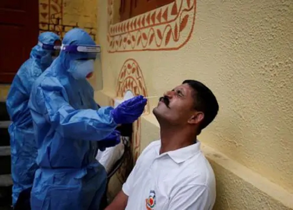 India reports record daily jump of 75,760 coronavirus infections