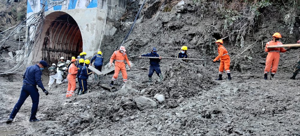 Rescuers in India digging for 37 trapped in glacier flood