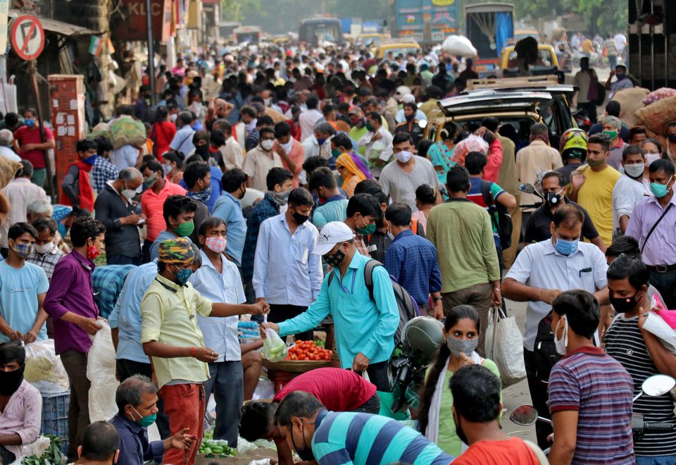 Indian coronavirus cases surge to new record as health system staggers