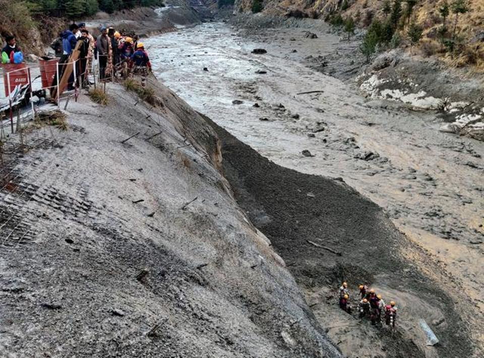 Rescuers search for 125 missing after glacier burst in Indian Himalayas, many believed trapped in tunnel