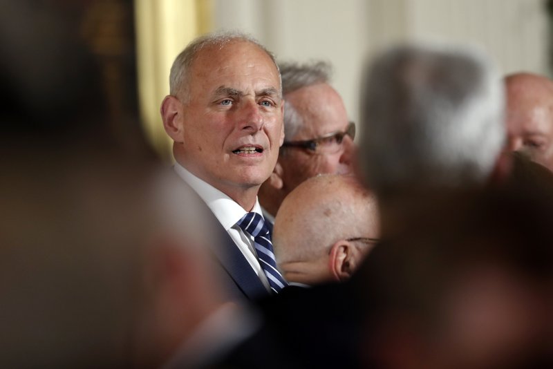 Kelly flexes muscle his first day on the job at White House