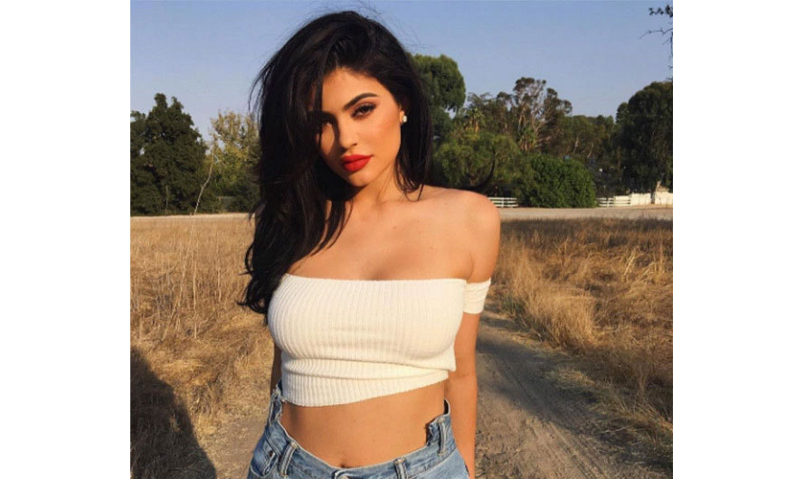 Kylie Jenner from KUWTK Flashes Curves in Sparkly Dress in Sultry