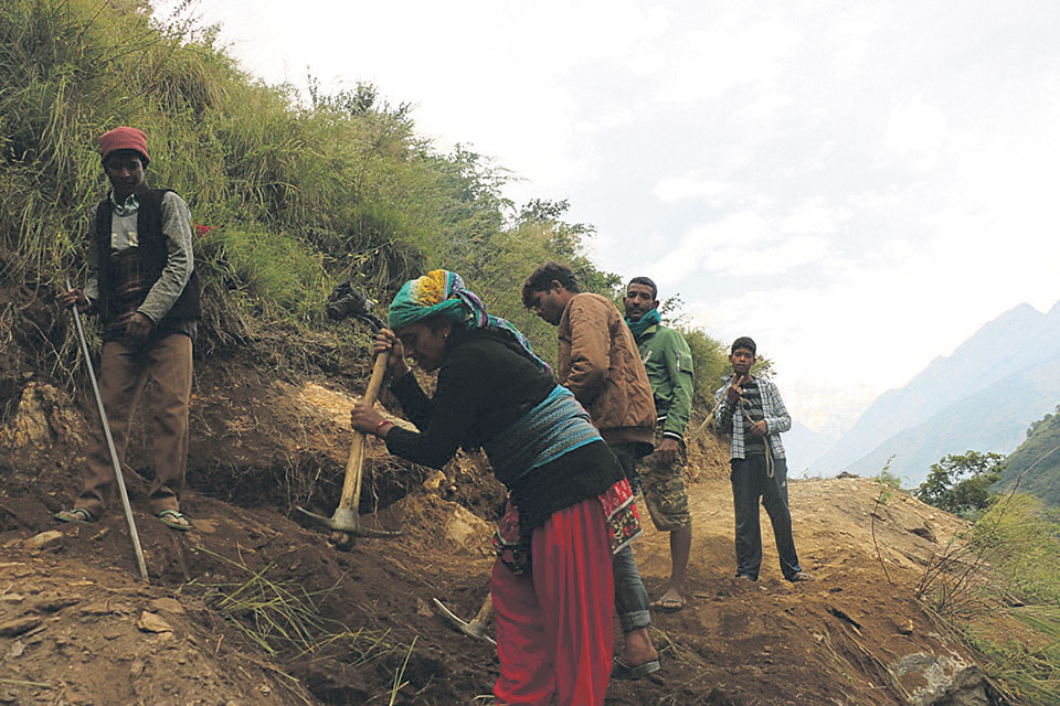 Children working on road project implemented by Nepal Army