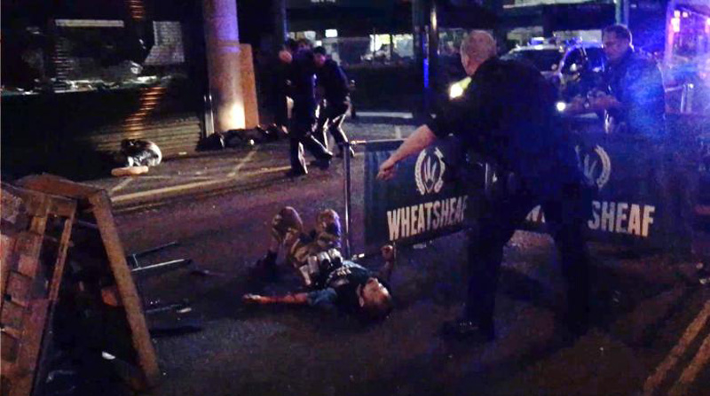 UK arrests three as footage of London Bridge attack appears online