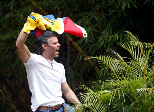 Granted house arrest, Venezuela opposition leader vows to fight on