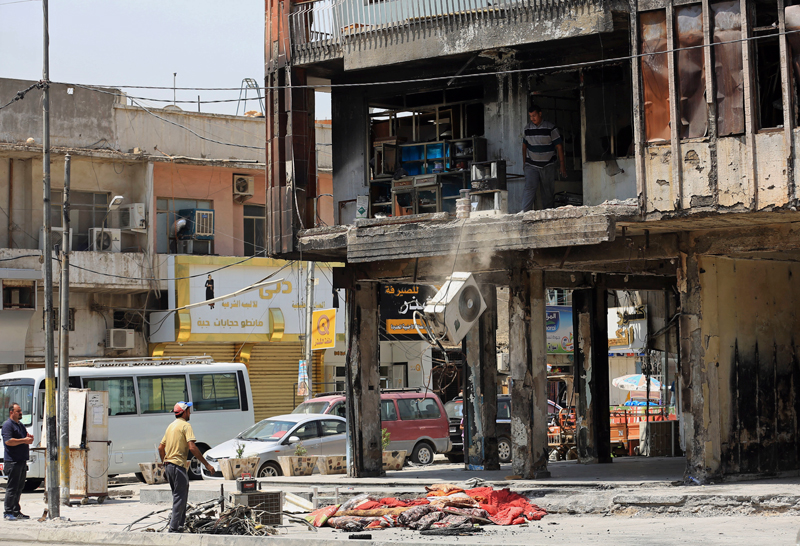 IS car bombing kills at least 12 civilians in Iraqi capital