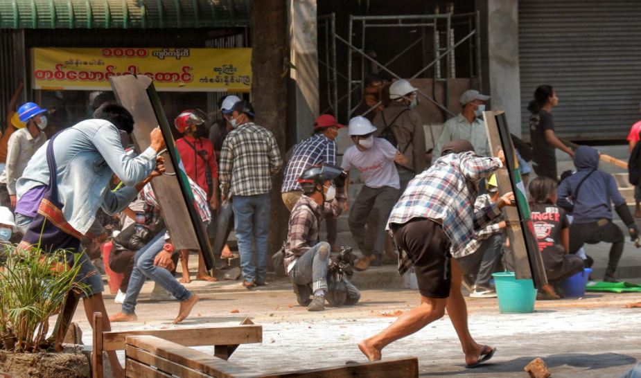 Nine dead in Myanmar as police fire to break up protests
