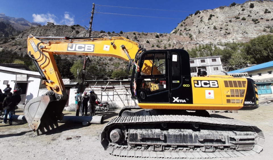Japan hands over excavator to Tukche village