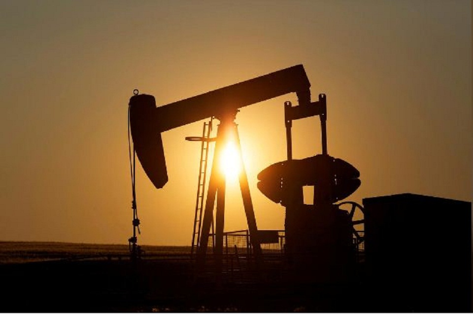 Oil falls as crude in U.S. storage nears all-time high