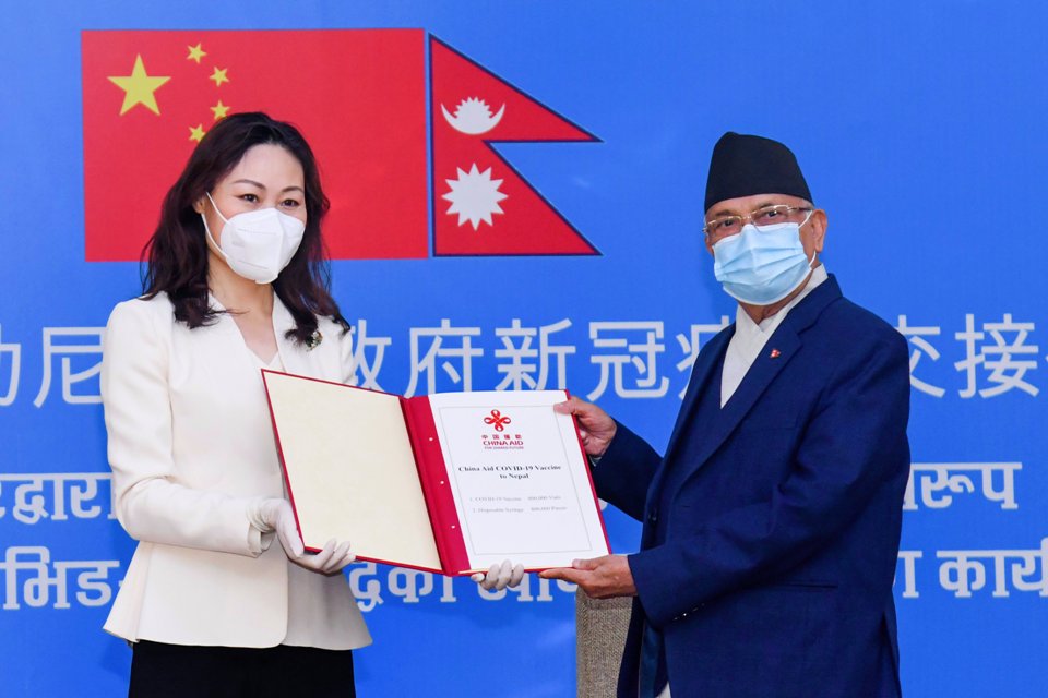 Chinese envoy hands over 800,000 doses of COVID-19 vaccine donated by Chinese govt to PM Oli