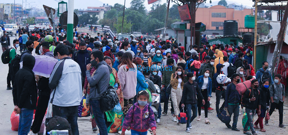 Photos: Hard-hit by lockdown, thousands leave Kathmandu