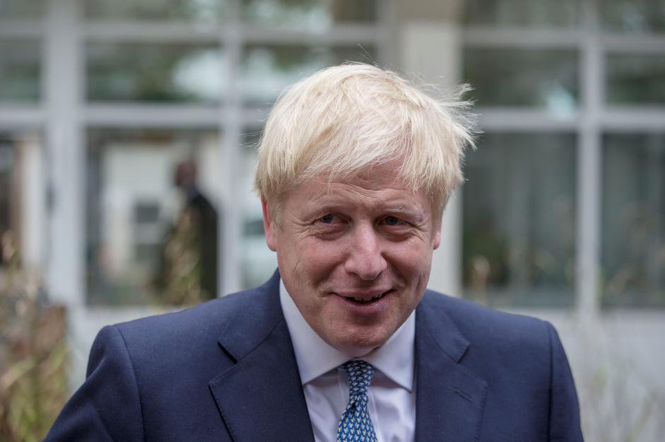 Johnson flies back to face parliament as Brexit chaos deepens