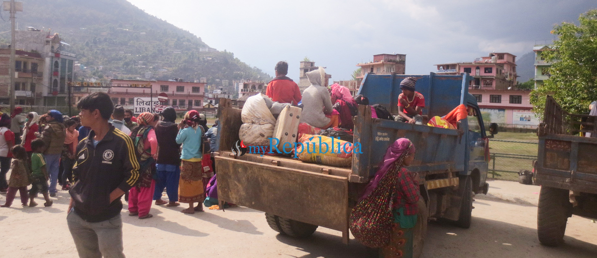 Photos: A difficult journey from Kathmandu to Rolpa with children on tipper