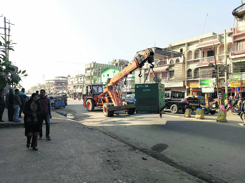 Birtamod bulldozing illegal roadside structures