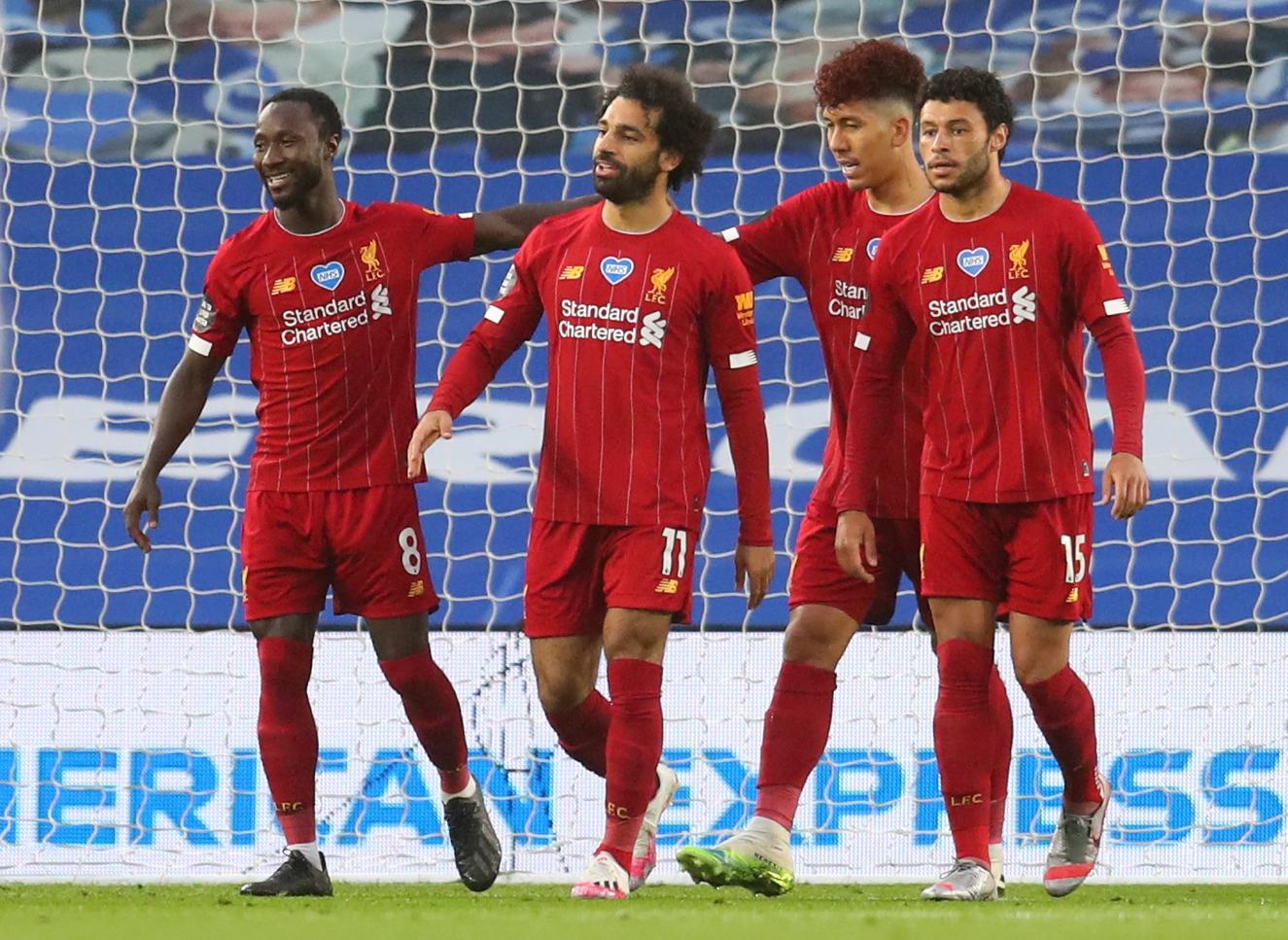 Salah double keeps Liverpool on track for points record
