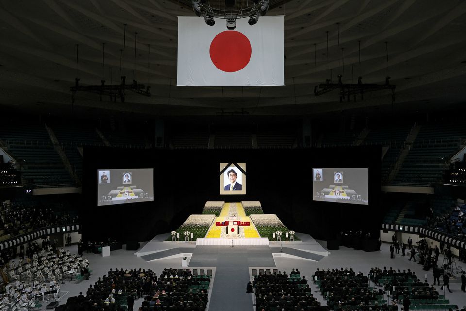 With flowers and a gun salute, Japan bids farewell to slain Abe at state funeral