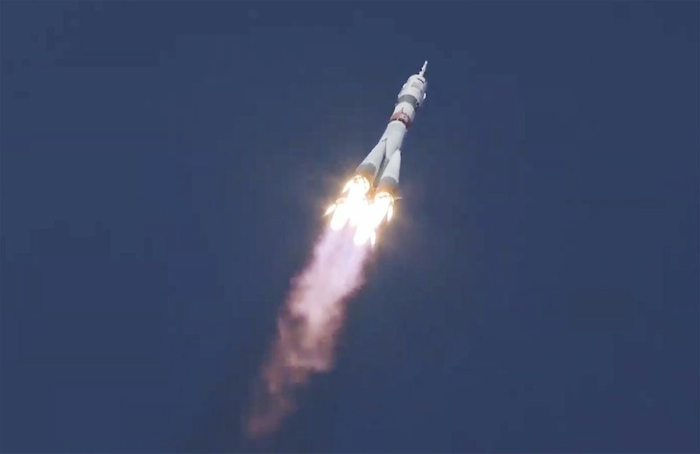 Russian-US crew launches on fast track to the space station