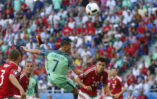 Portugal and Hungary advance,  after thrilling 3-3 draw