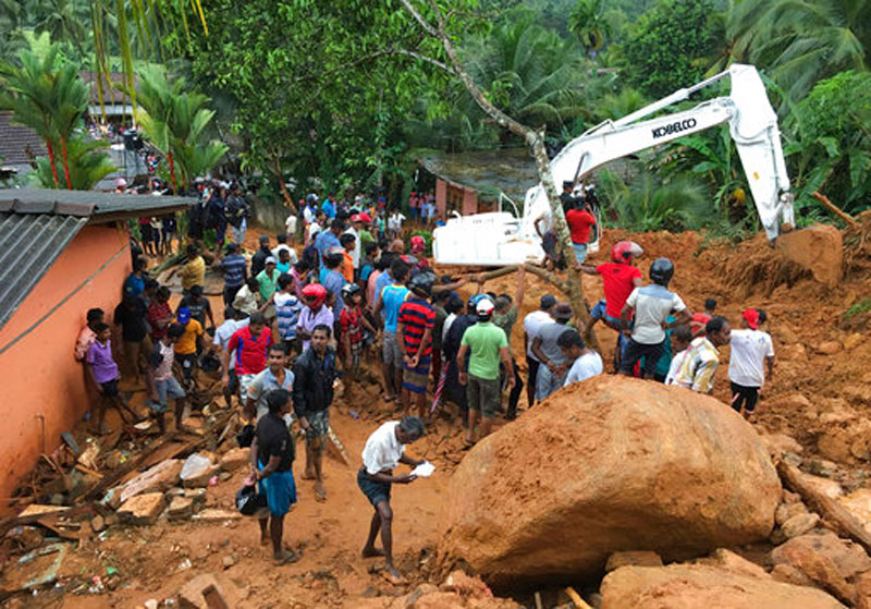 Sri Lanka confirms 100 dead in mudslides; 99 missing