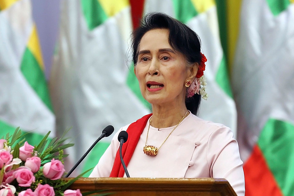 As Rohingya flee violence, Myanmar's Suu Kyi skips UN meet