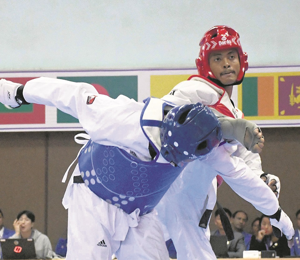 Shrestha bags 12th taekwondo gold for Nepal