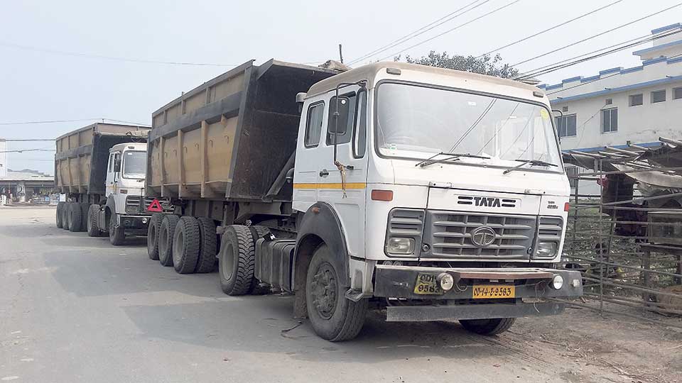 Overloaded carriers using decrepit bridge, four tippers seized