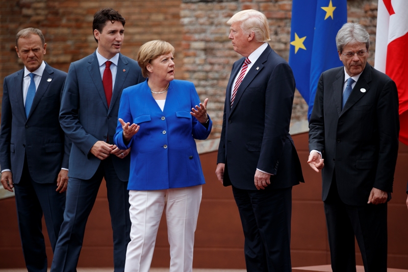G7 leaders divided on climate change, closer on trade issues